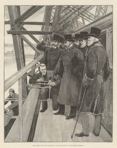 De Prins van Wales slaat de laatste klinknagel in de Forth Bridge